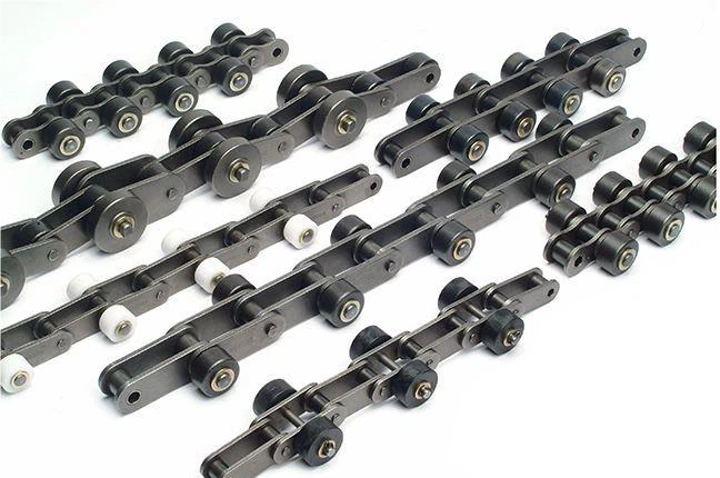 Conveyor chains with outboard rollers